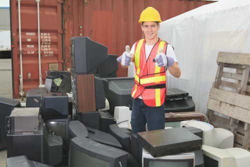 Office clearance team removing furniture in a Sanderstead office