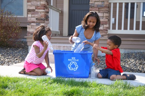 Workers sorting recyclables at a commercial premises